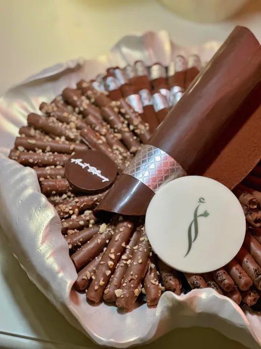 A generous tray of chocolate pieces with a personalised presentation